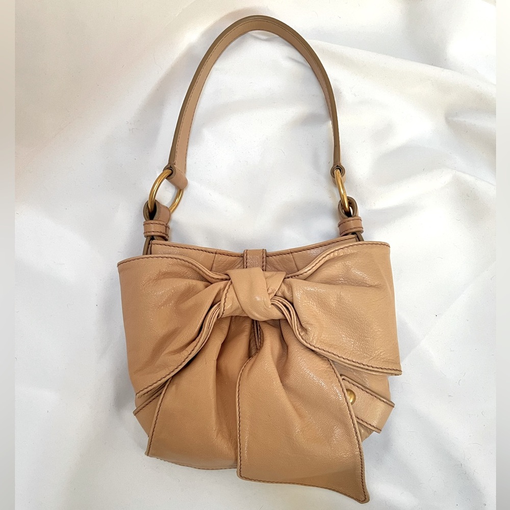 Vintage Yves Saint Laurent leather Bow Chèvre mini bag, 7x8” circa 2006
